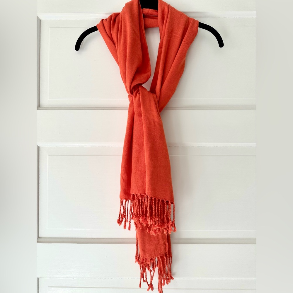 Beautiful bright orange fringed scarf